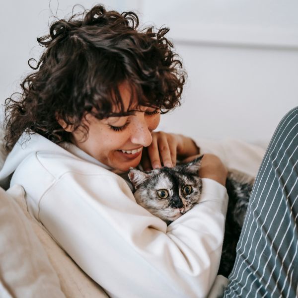 cuddling anxious cat